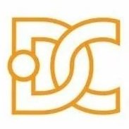 A stylized gold monogram logo with overlapping initials.