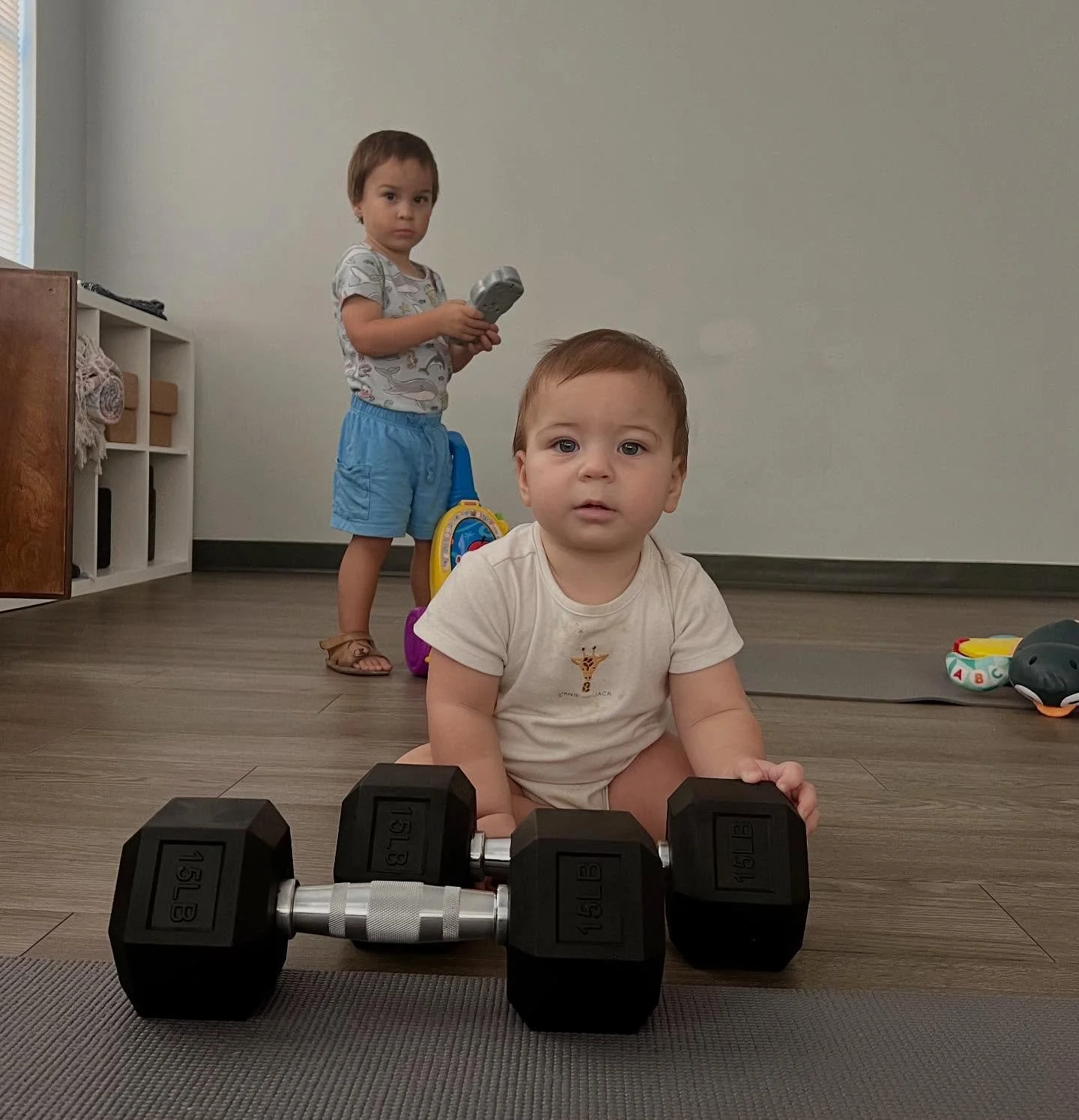 Some of our smallest cheerleaders come with us to class.
They watch, they giggle, they sometimes grab the dumbbells.
And somehow, the workout feels lighter with them nearby.

Evening sessions can be a sweet way to pass those long hours between dinner