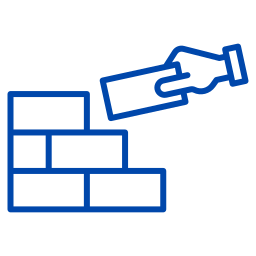 Illustration of a hand placing a brick onto a wall.