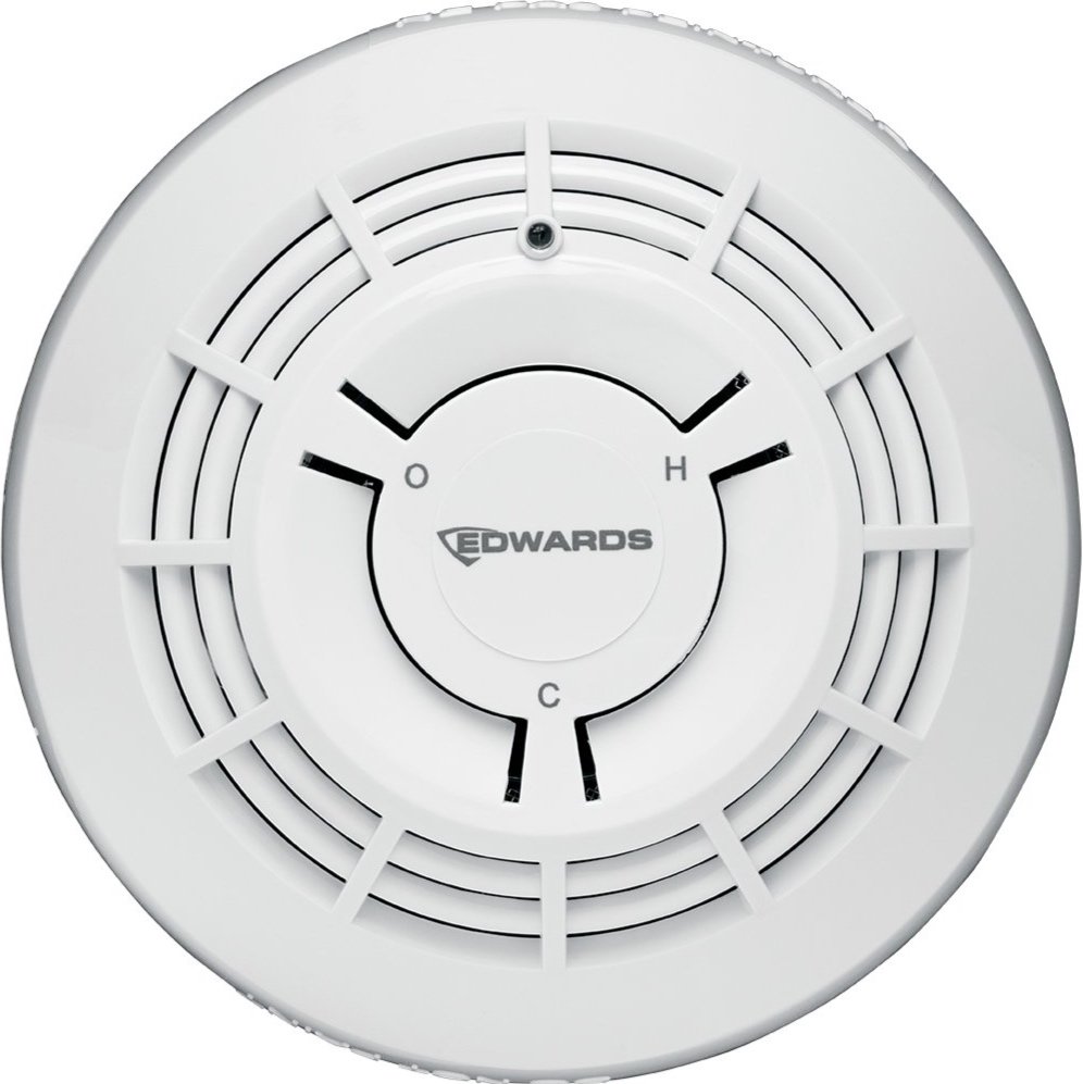 White thermostat with black markings, labeled Edwards, showing temperature settings between cool and hot, with adjustable slider.