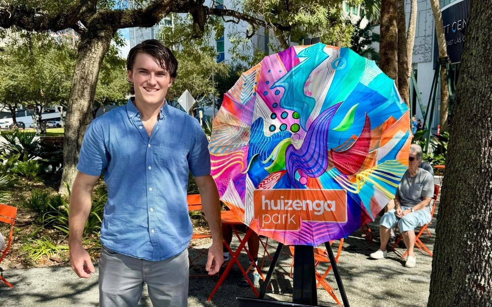 Colin Breslin with his hand-painted umbrella at Huizenga Park