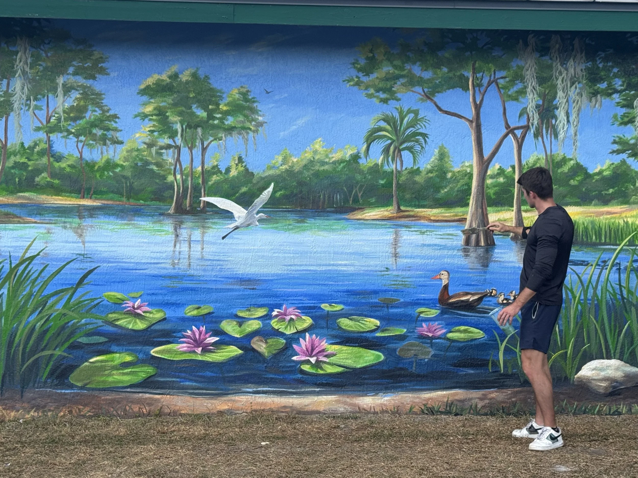 Colin Breslin at the Song of the Cypress mural