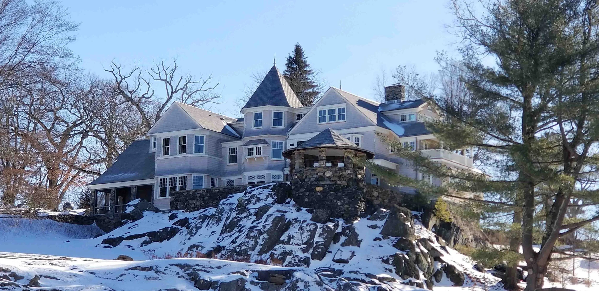 Historical restoration in Washington, Connecticut featuring a wood roof using Alaskan yellow cedar shingles, paired with lead-coated copper flashing and gutters for long-lasting performance and historic authenticity.