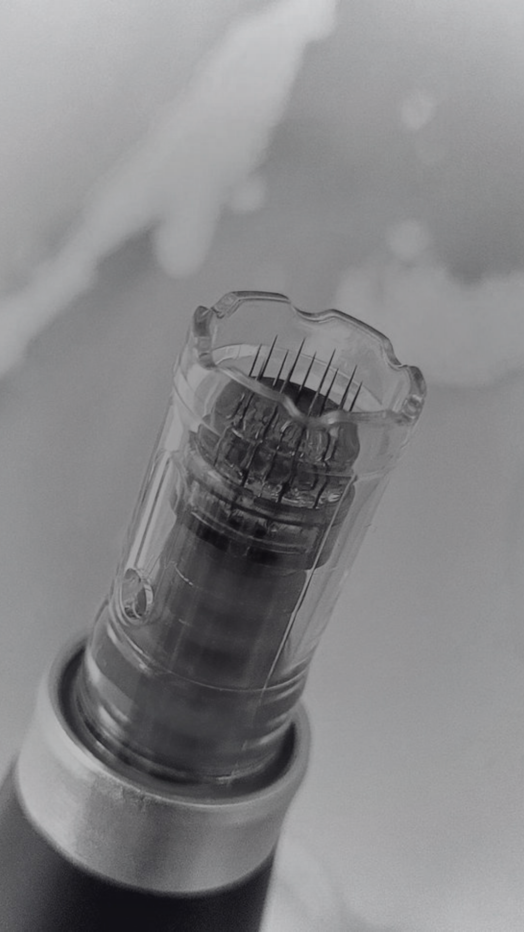 Close-up view of a skin pen microneedling device
