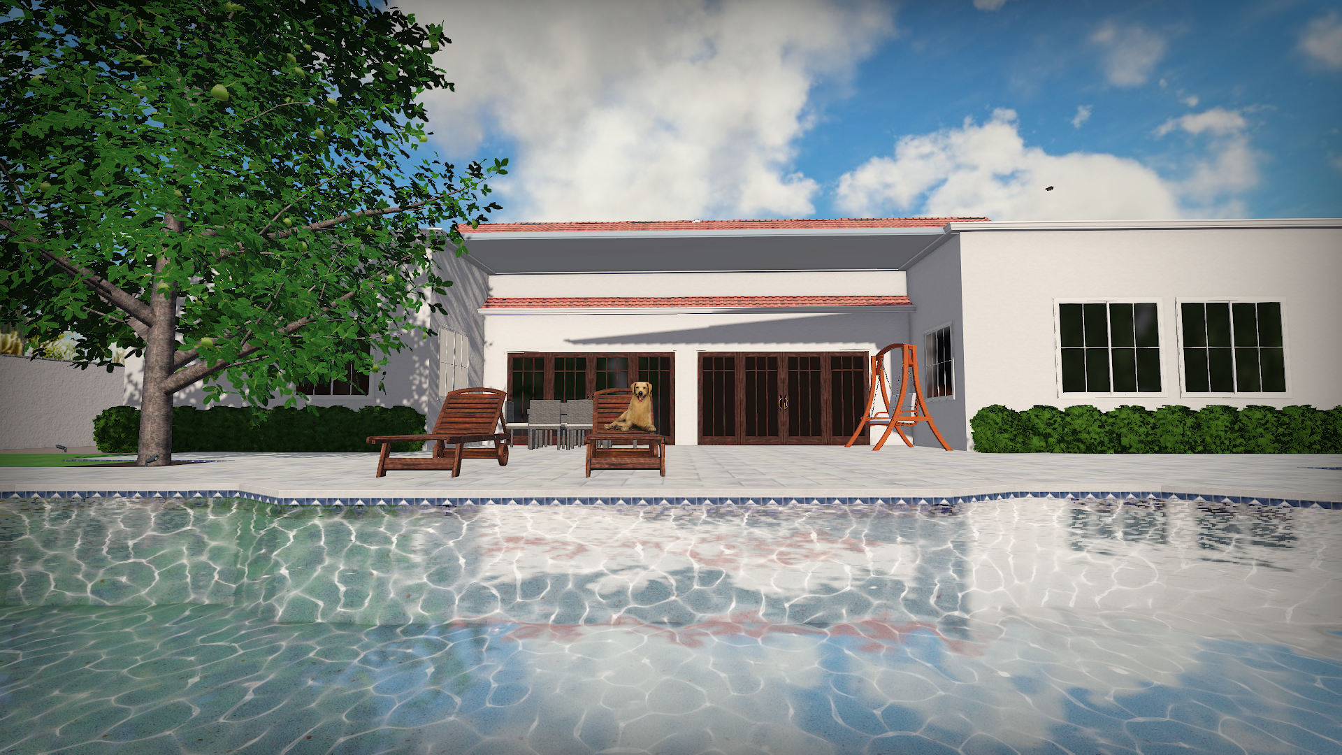 Backyard view with a swimming pool, two wooden lounge chairs, a dog sitting on one, a table with chairs, a tree with green leaves, bushes, and a white house with large windows and a red-tiled roof under a partly cloudy sky.