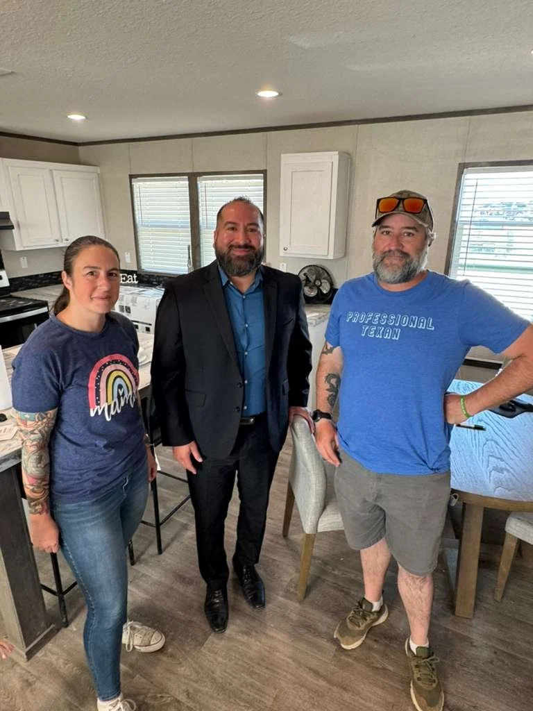 New homeowner with their manufactured home sold by Cowboy Capital Cottages in Bandera TX