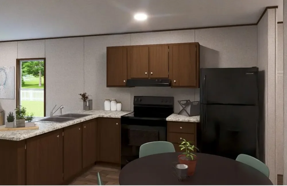 Kitchen with dark refrigerator, black stove, upper wooden cabinets, granite countertops, small window, round dining table with green chairs, small plant, and minimal decor.