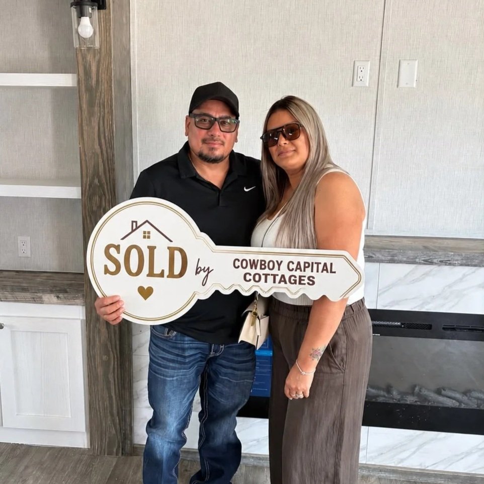 New homeowner with their manufactured home sold by Cowboy Capital Cottages in Bandera TX
