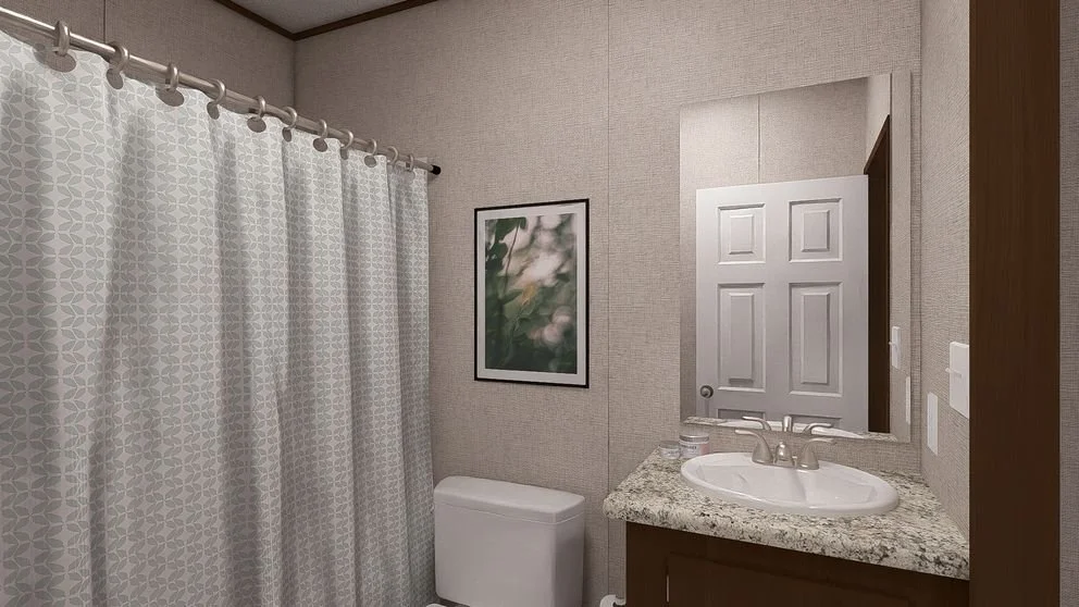 Bathroom with a shower curtain, toilet, bathroom sink with granite countertop, mirror, framed wall art, and closed double door.