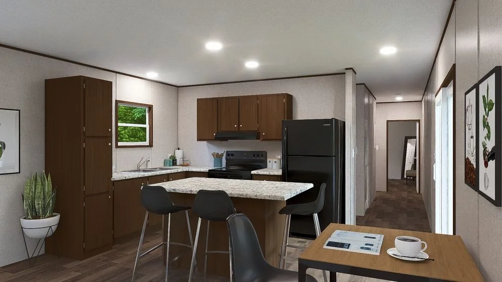 Interior view of a modern kitchen with wooden cabinets, black appliances, a small island with seating, and a hallway leading to other rooms.