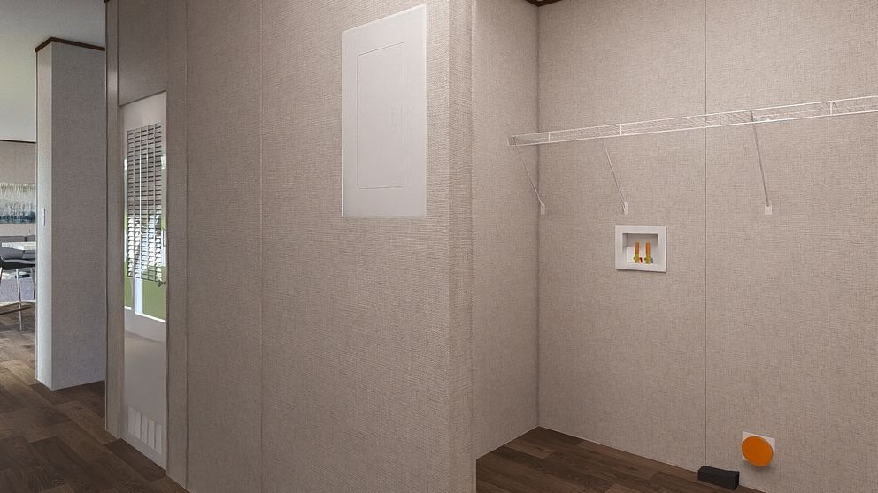 Empty laundry room with a wire shelf, small recessed shelf with cleaning supplies, and a circular orange vent on the floor.
