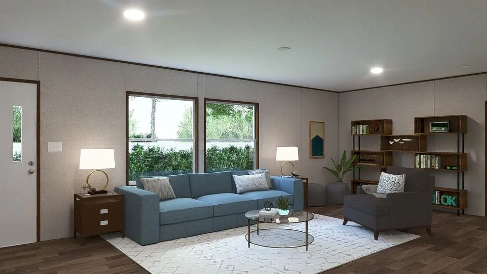Living room with blue sofa, gray armchair, bookshelf, wooden flooring, large windows, and modern decor.