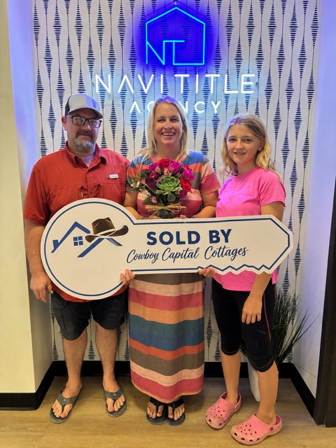 New homeowner with their manufactured home sold by Cowboy Capital Cottages in Bandera TX