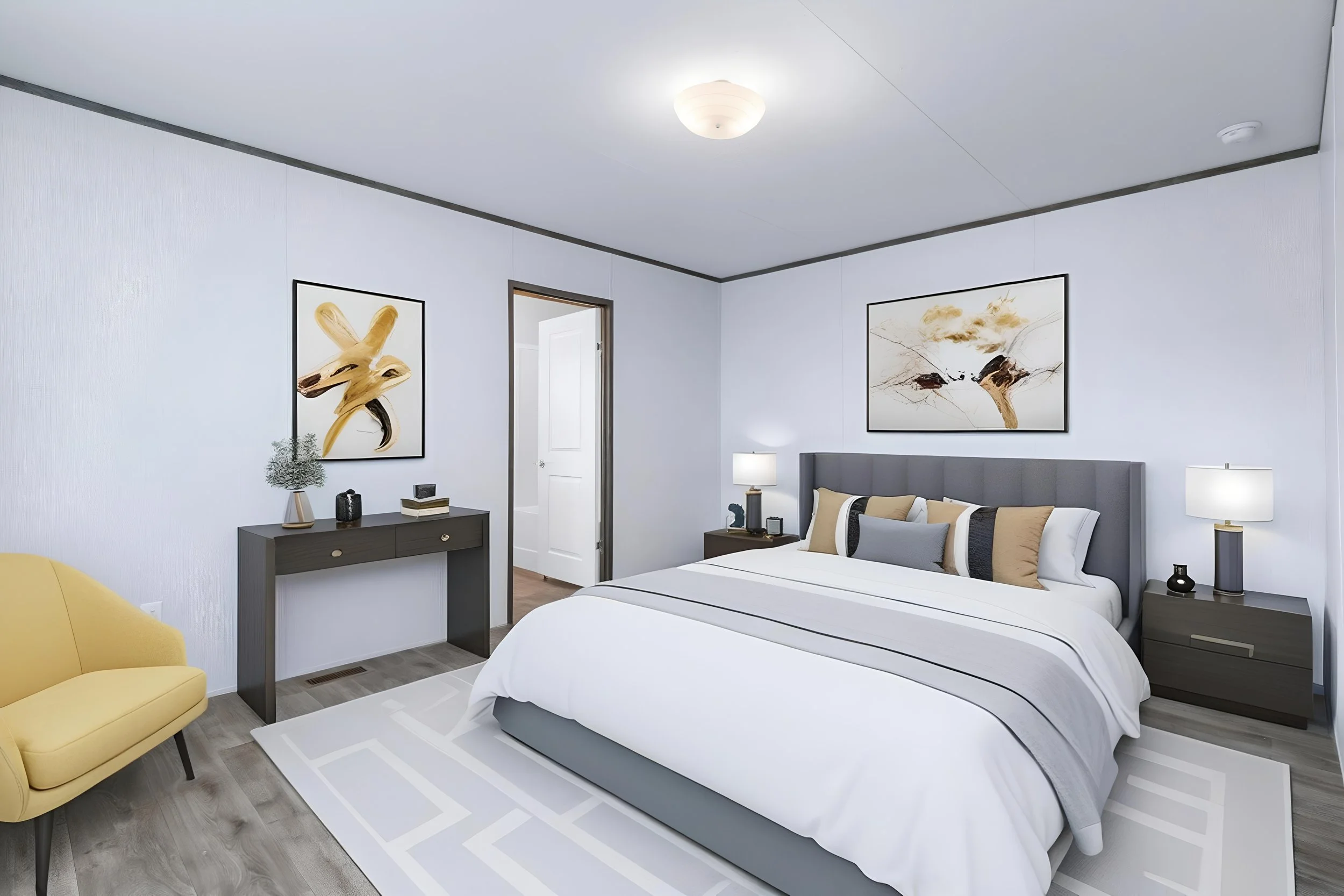 A modern bedroom with two white beds, a gray headboard, and matching gray nightstands. There are artistic paintings on the white walls, a small yellow armchair, and a black dresser with decorative items. The room is well-lit with ambient and bedside 