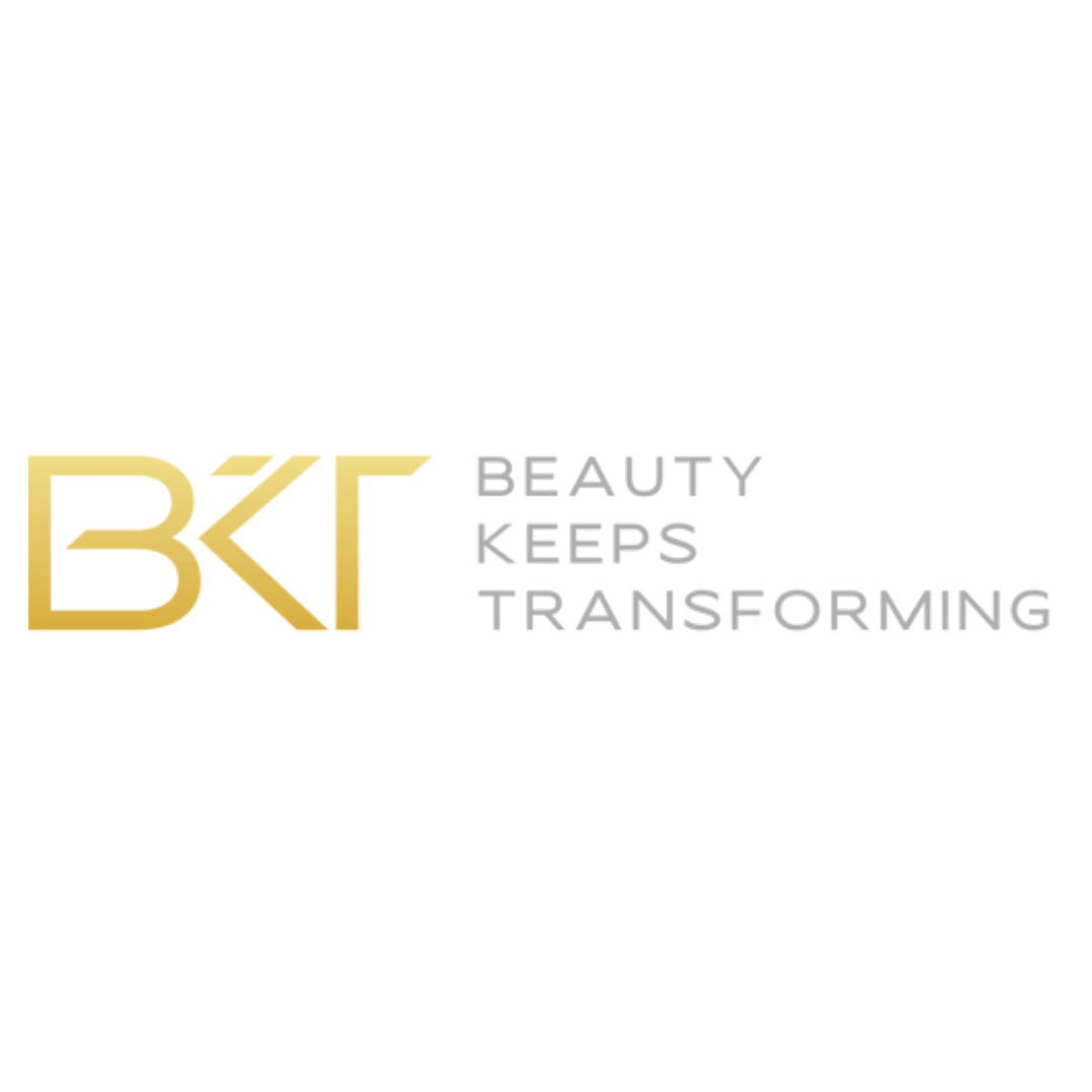 Logo for 'Beauty Keeps Transforming,' with yellow and silver text.
