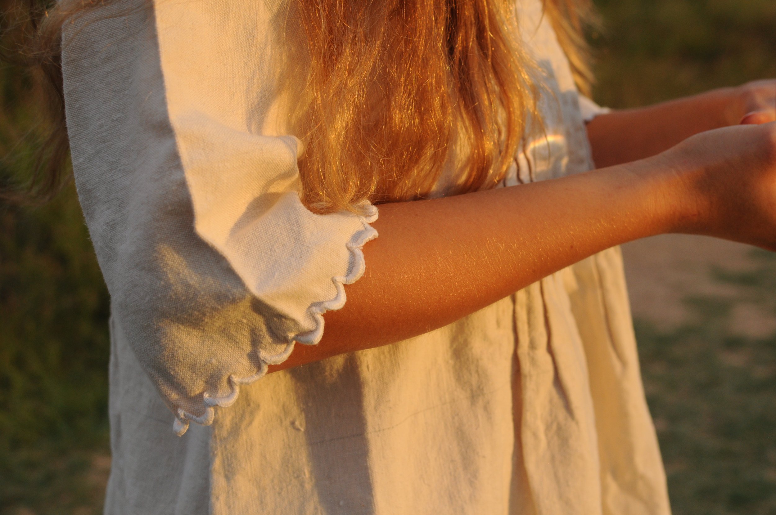 Scalloped sleeve cuff detail on antique Edwardian linen day dress