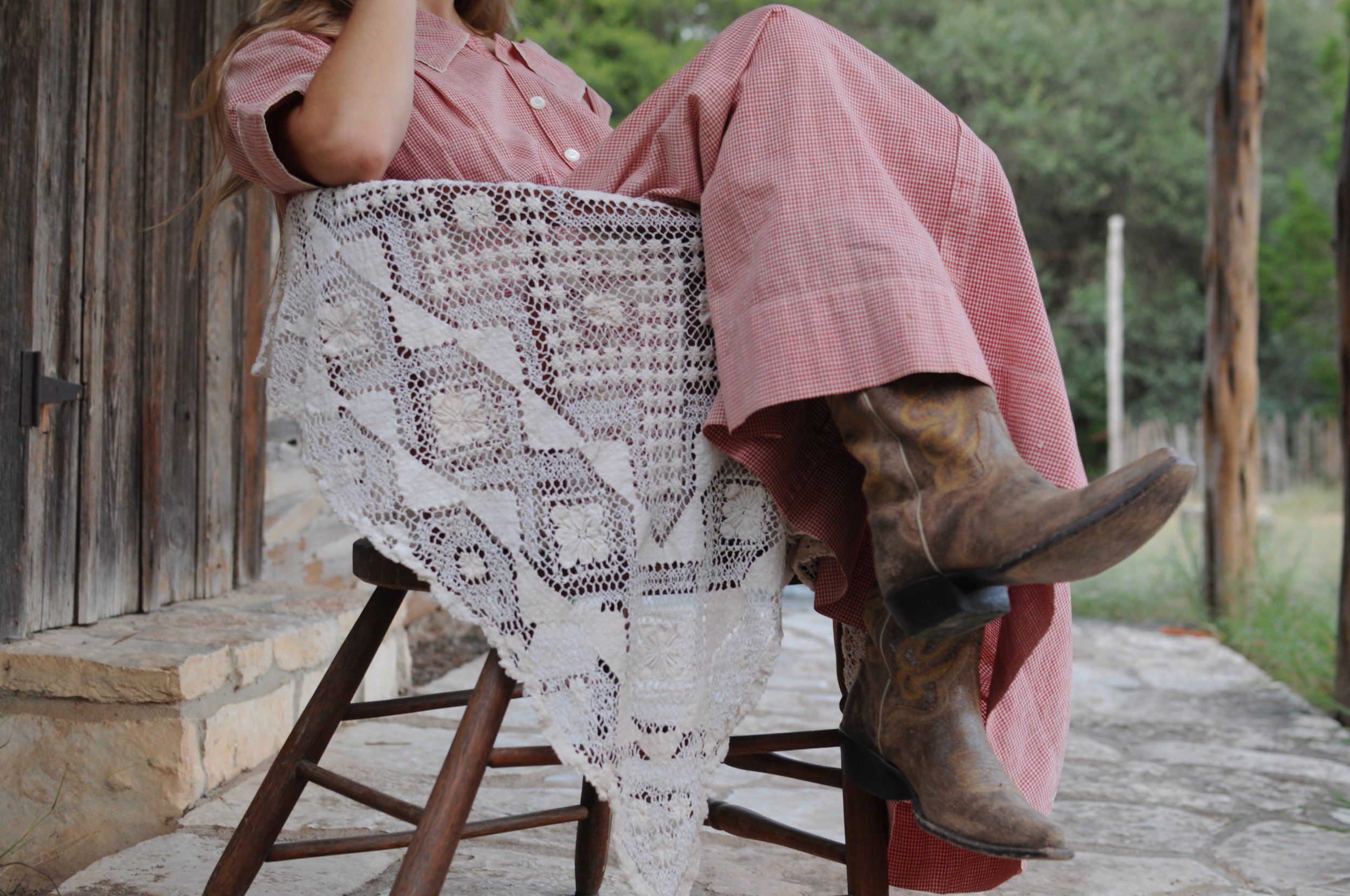 Woman seated wearing vintage 1940s strawberry gingham house dress