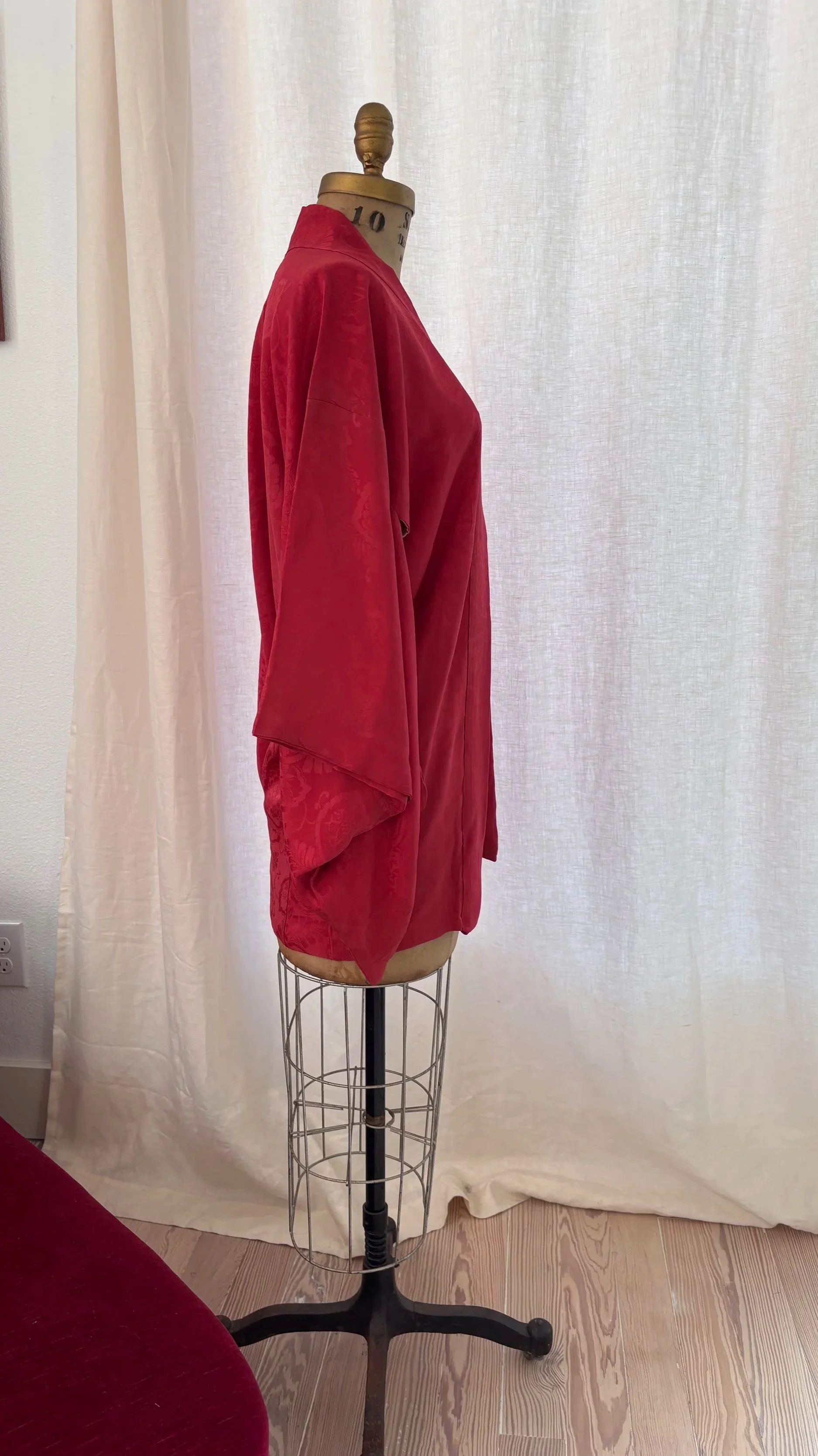 Side view of vintage Japanese silk haori showing drape and wide sleeves