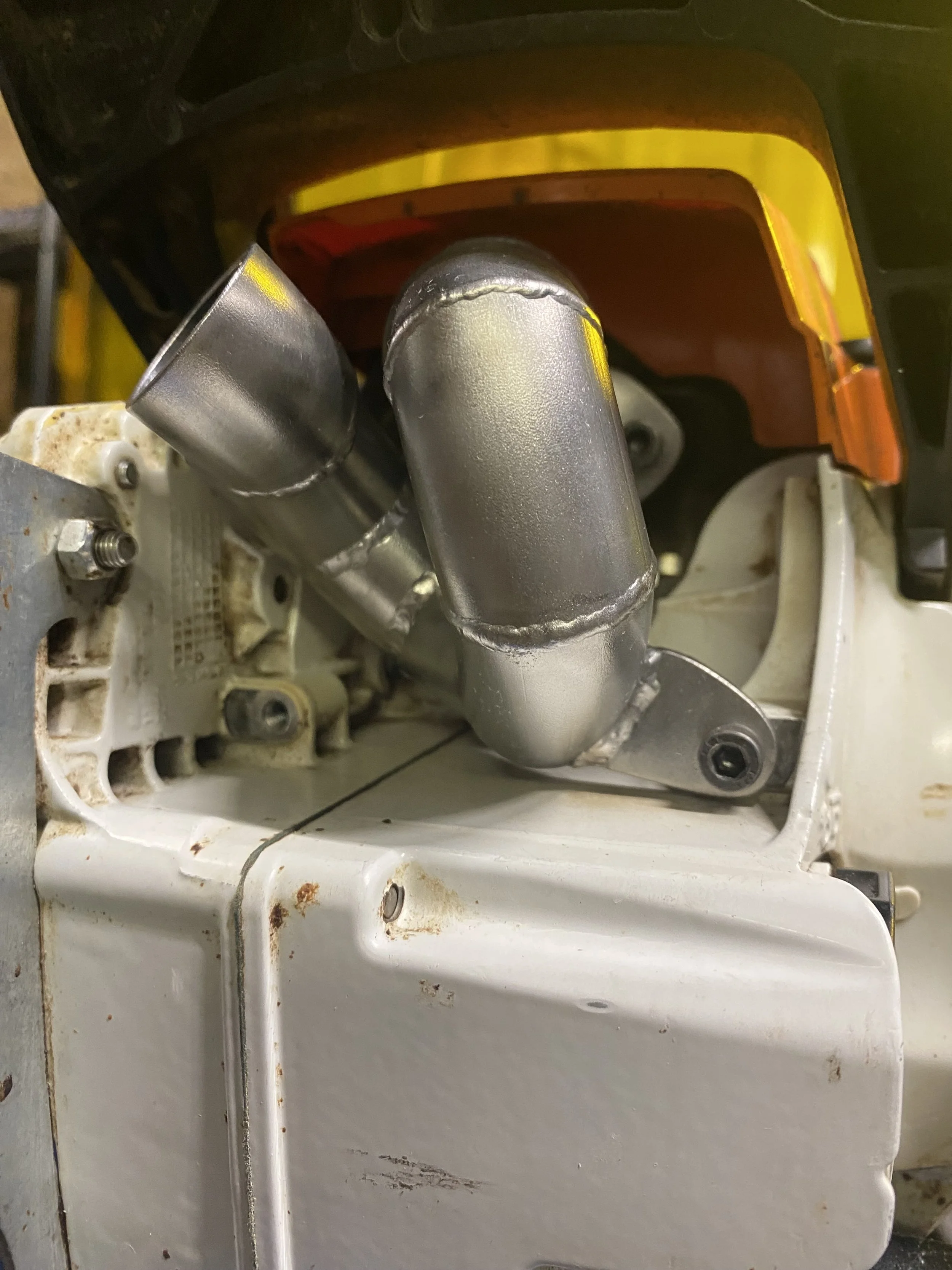 chainsaw exhaust pipe