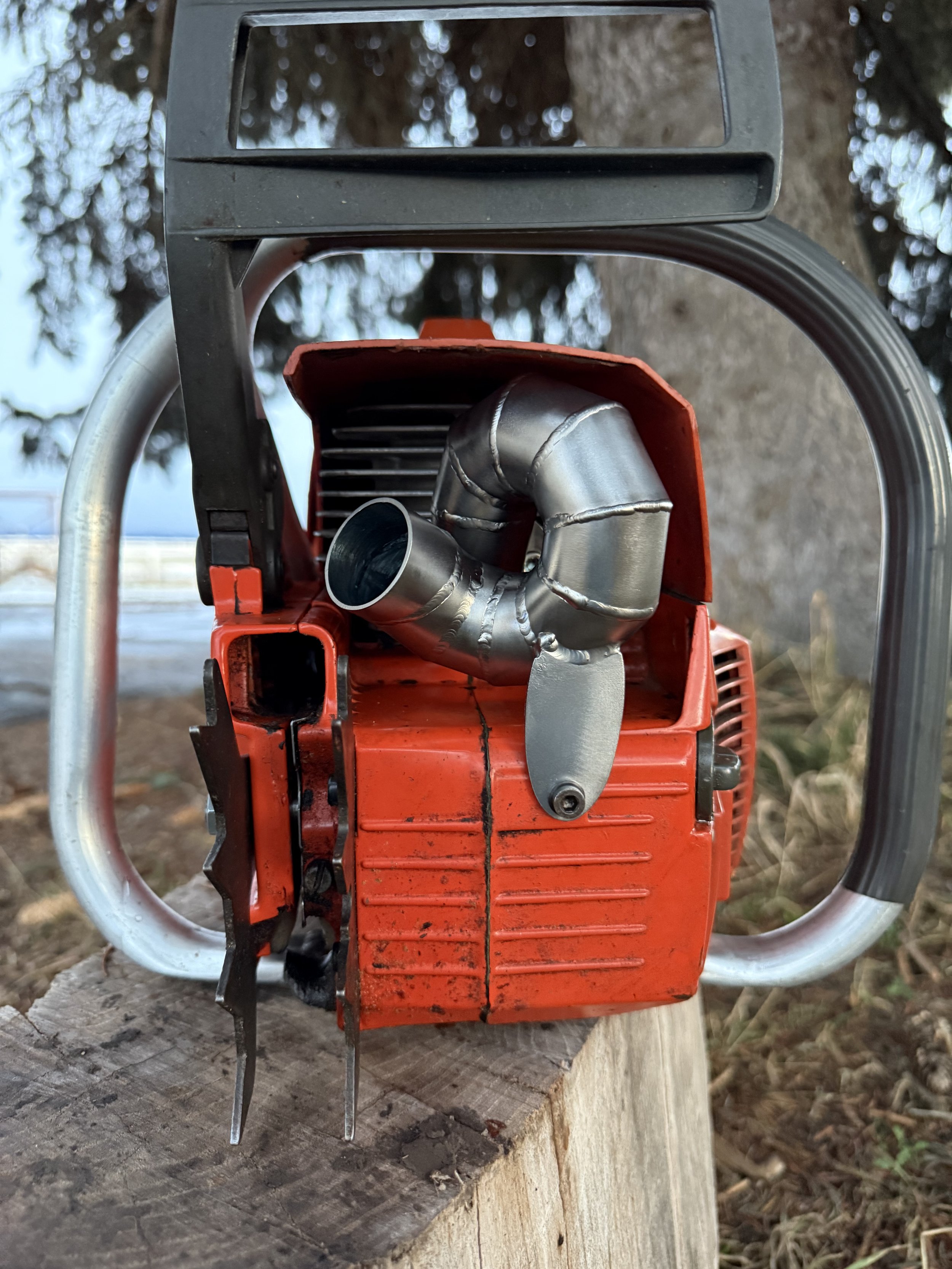 chainsaw exhaust pipe