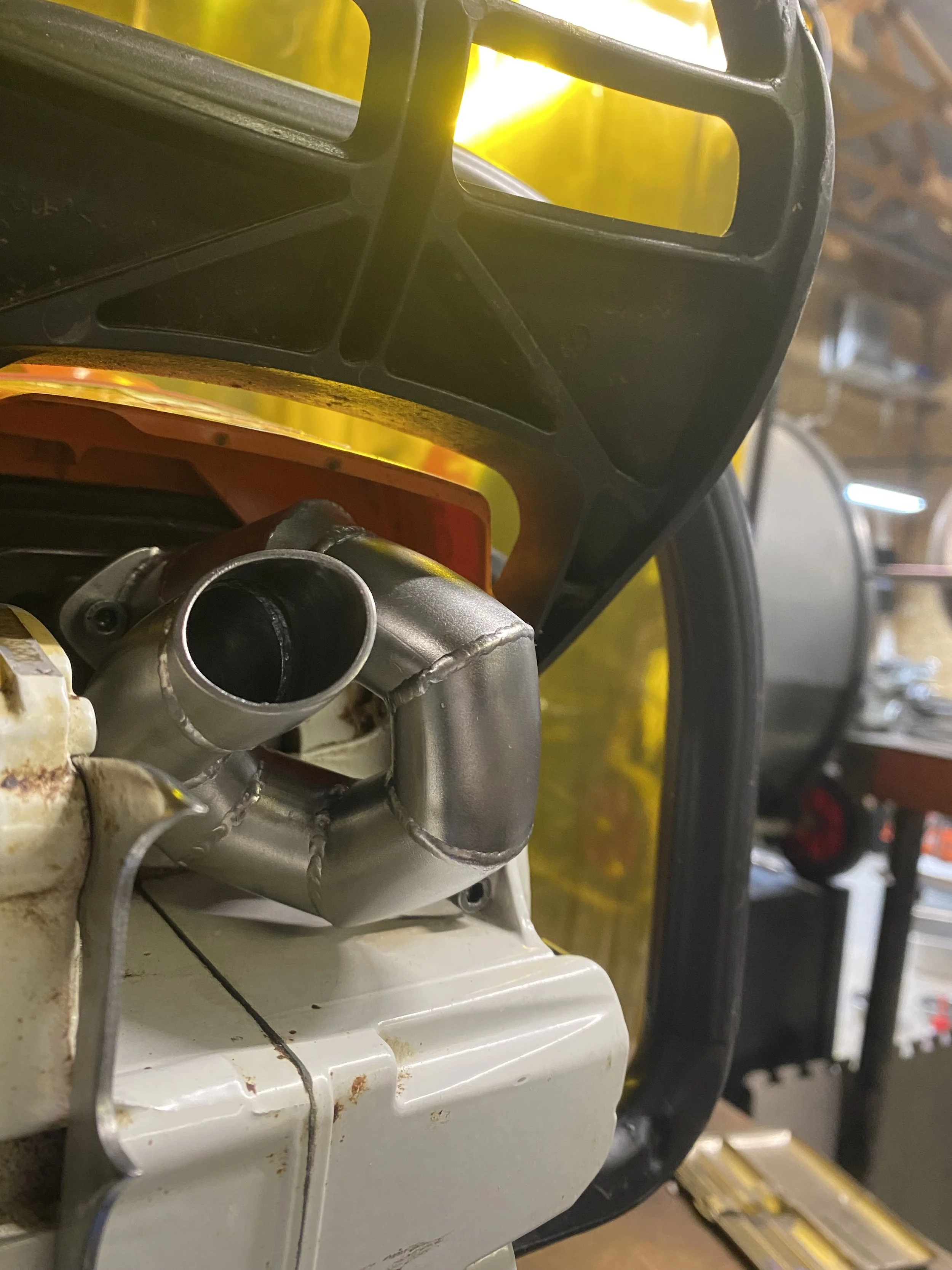 chainsaw exhaust pipe