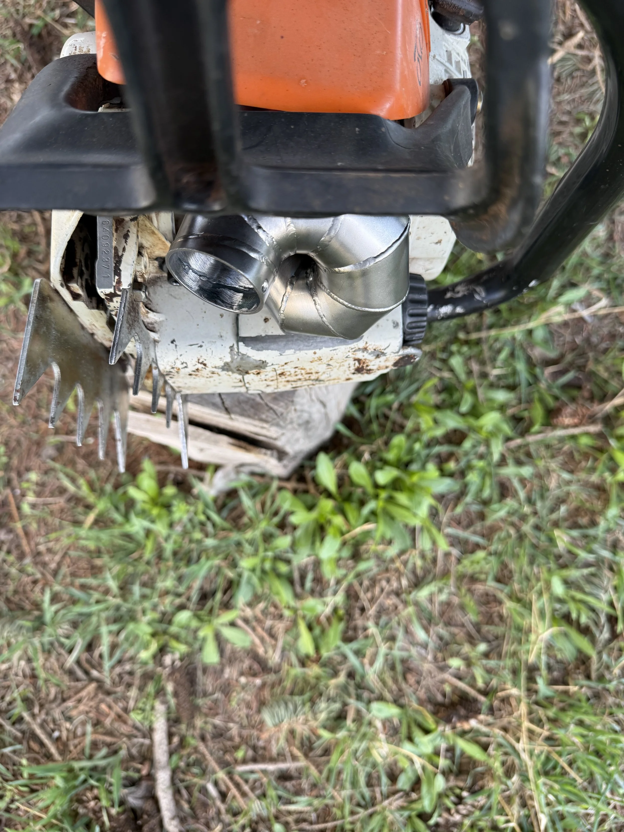 chainsaw exhaust pipe