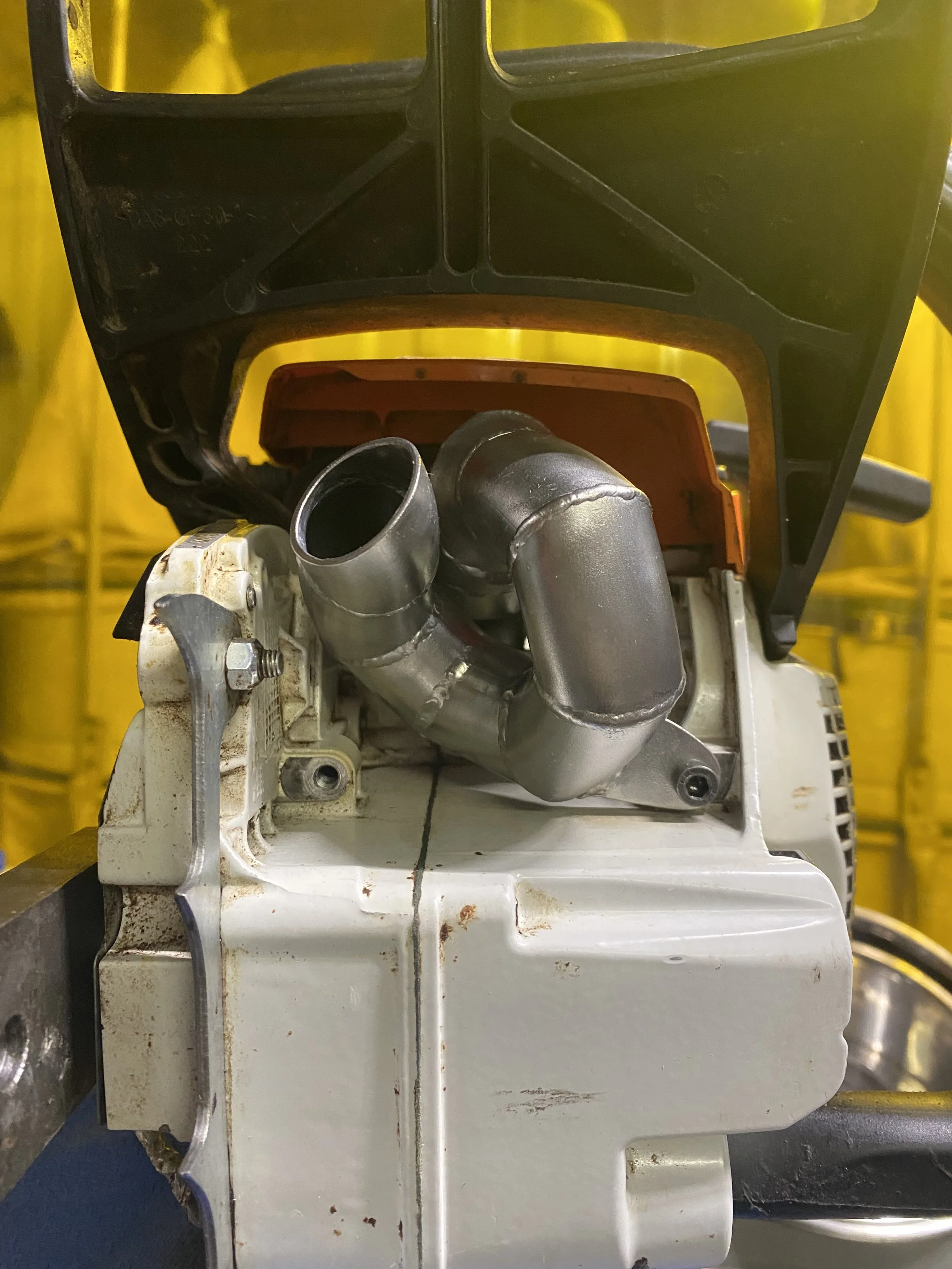 chainsaw exhaust pipe