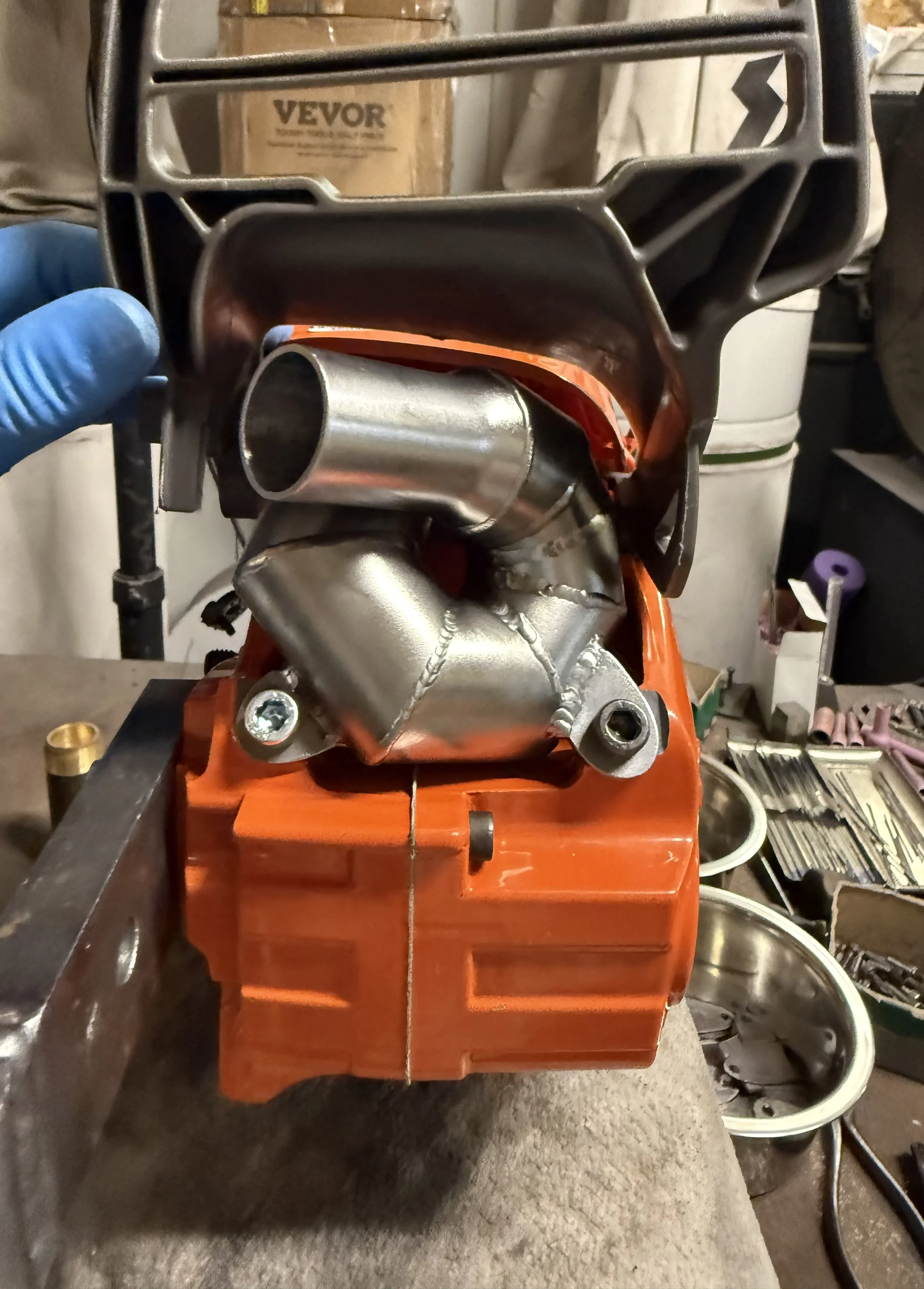 husqvarna 550xp ported muffler