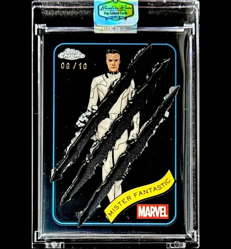 A collectible Marvel trading card featuring a illustration of a character in a white and black suit, with three claw marks overlayed. The card is labeled 'Mister Fantastic' and is encased in a clear protective case.