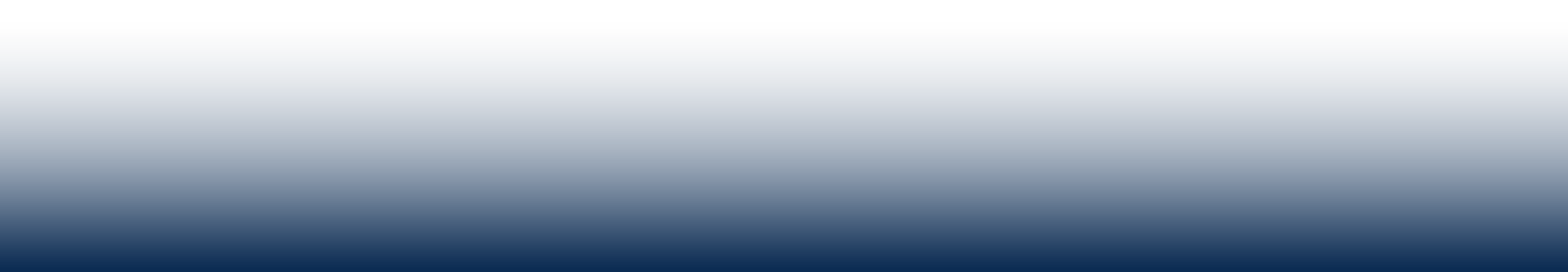 Solid dark blue background with no distinct objects or features.