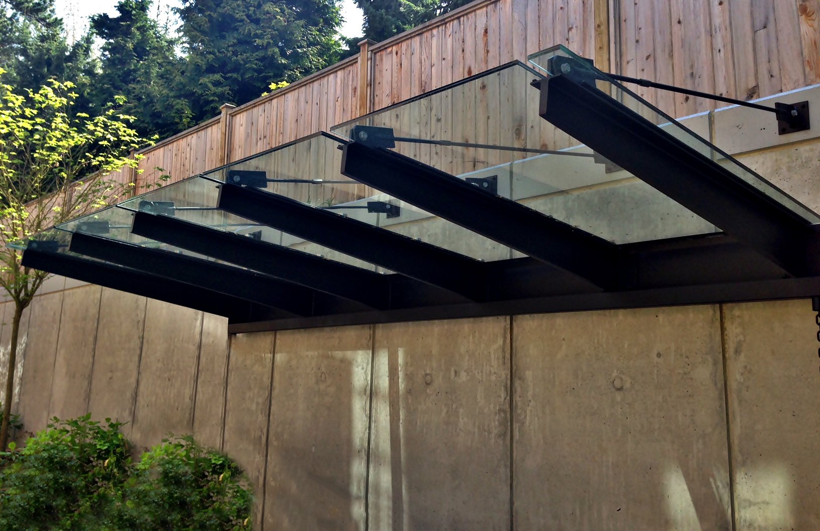 Weather protection canopy metal and glass Vancouver
