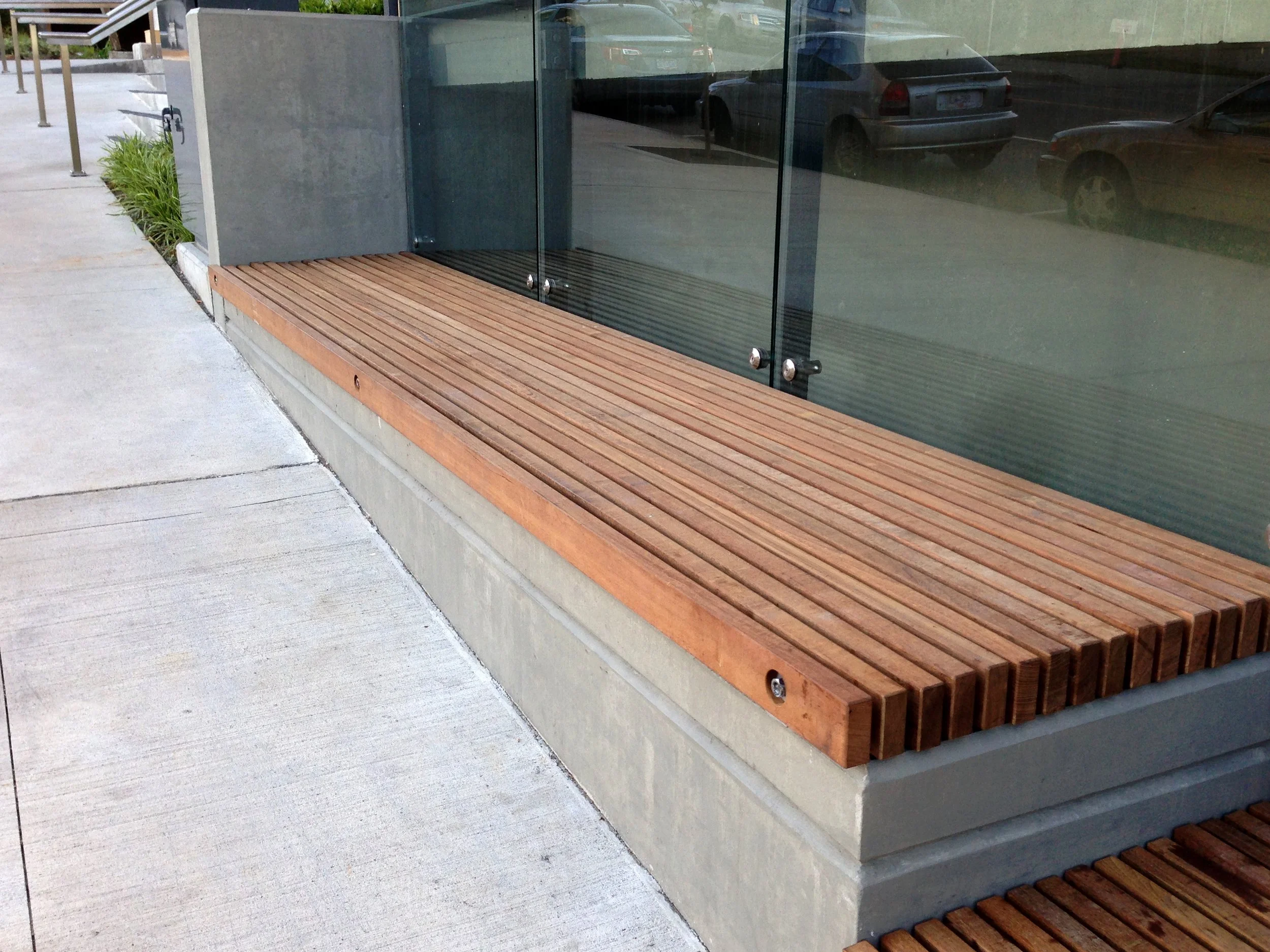 Custom metal bench with signage Vancouver public space