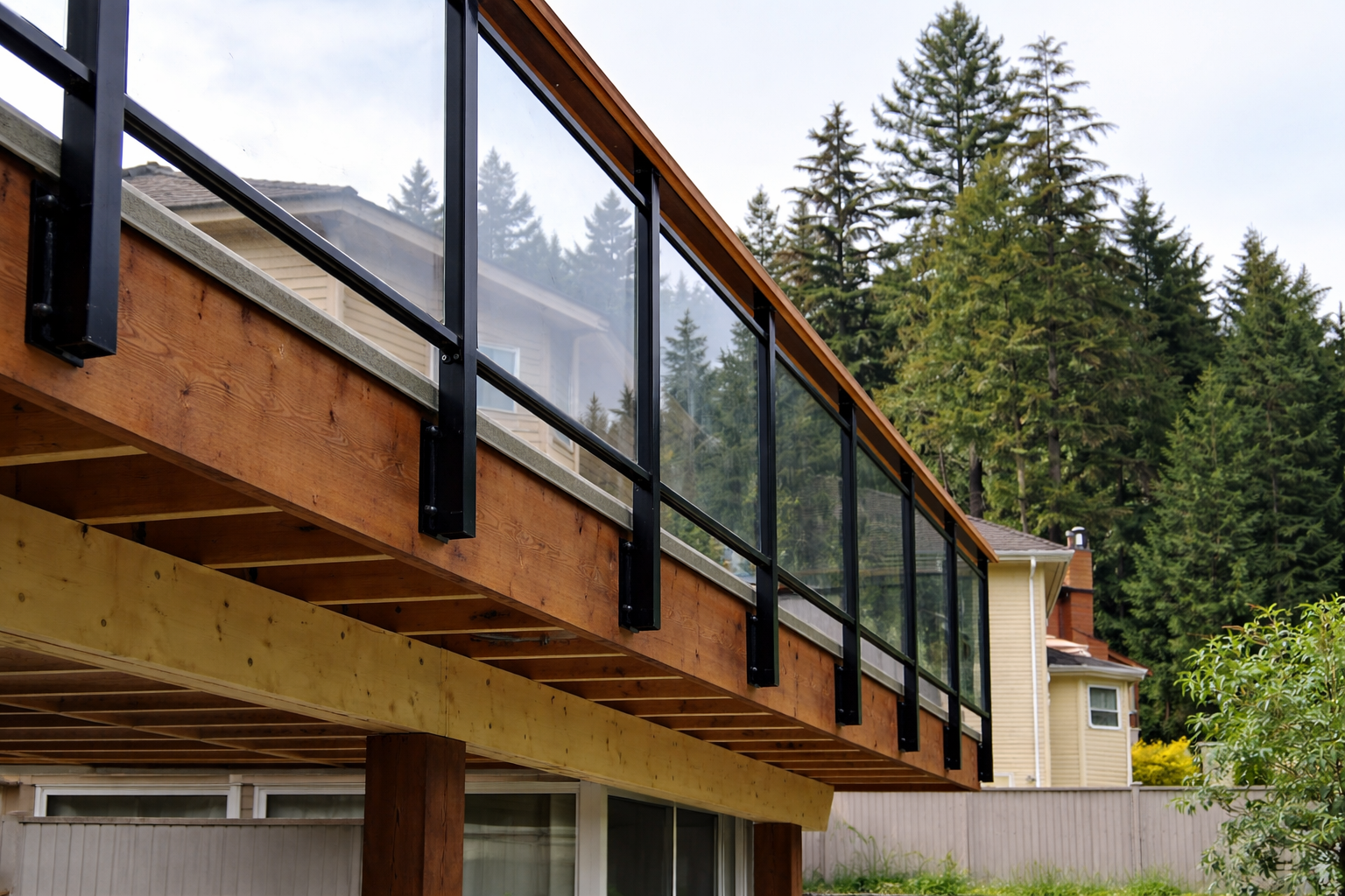 Exterior glass railing for deck and patio | Custom metal and glass railings in Vancouver by Iron Age Manufacturing 351
