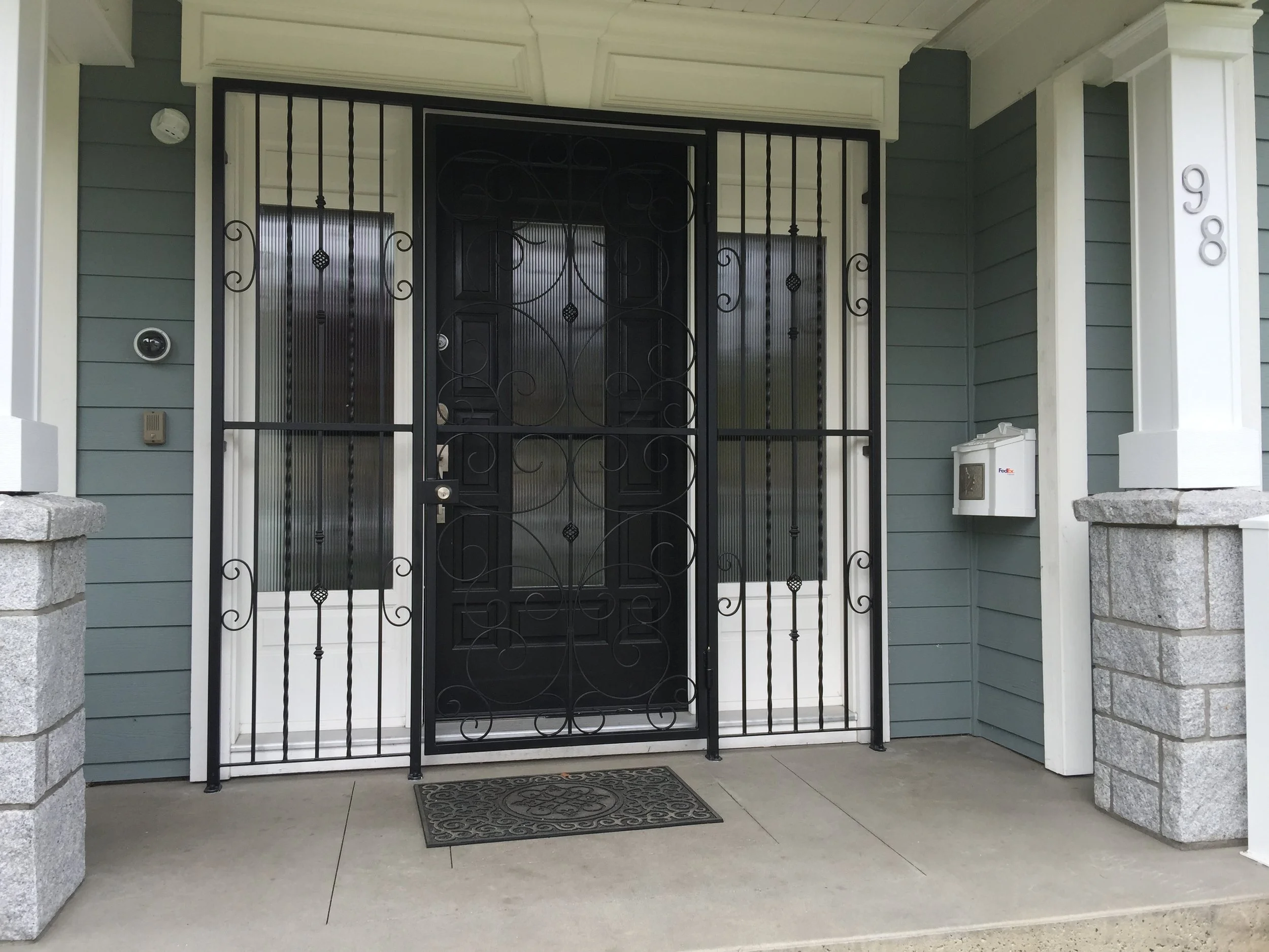 custom metal door design Vancouver residential entrance 