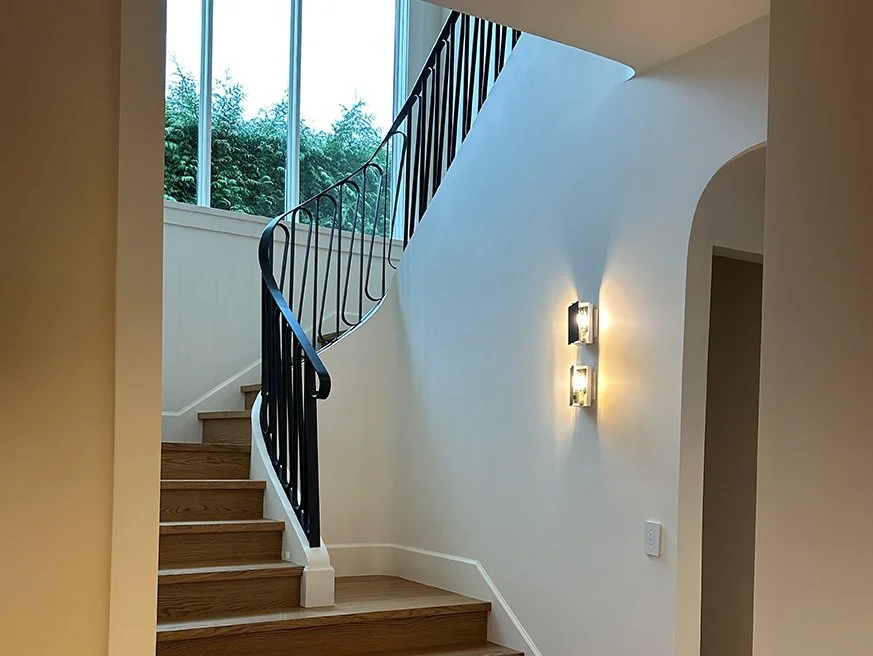 Custom metal staircase with clean architectural details fabricated by Iron Age Manufacturing Ltd.  File Name: