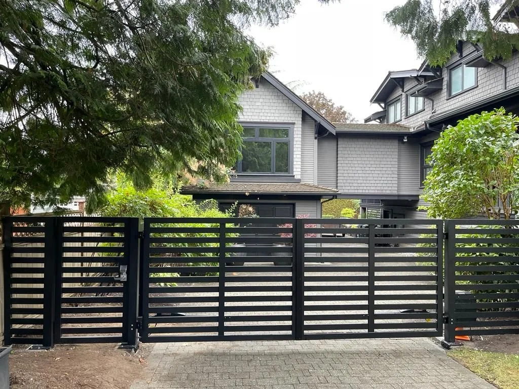 Custom aluminum steel driveway gate with modern black finish | Iron Age 684