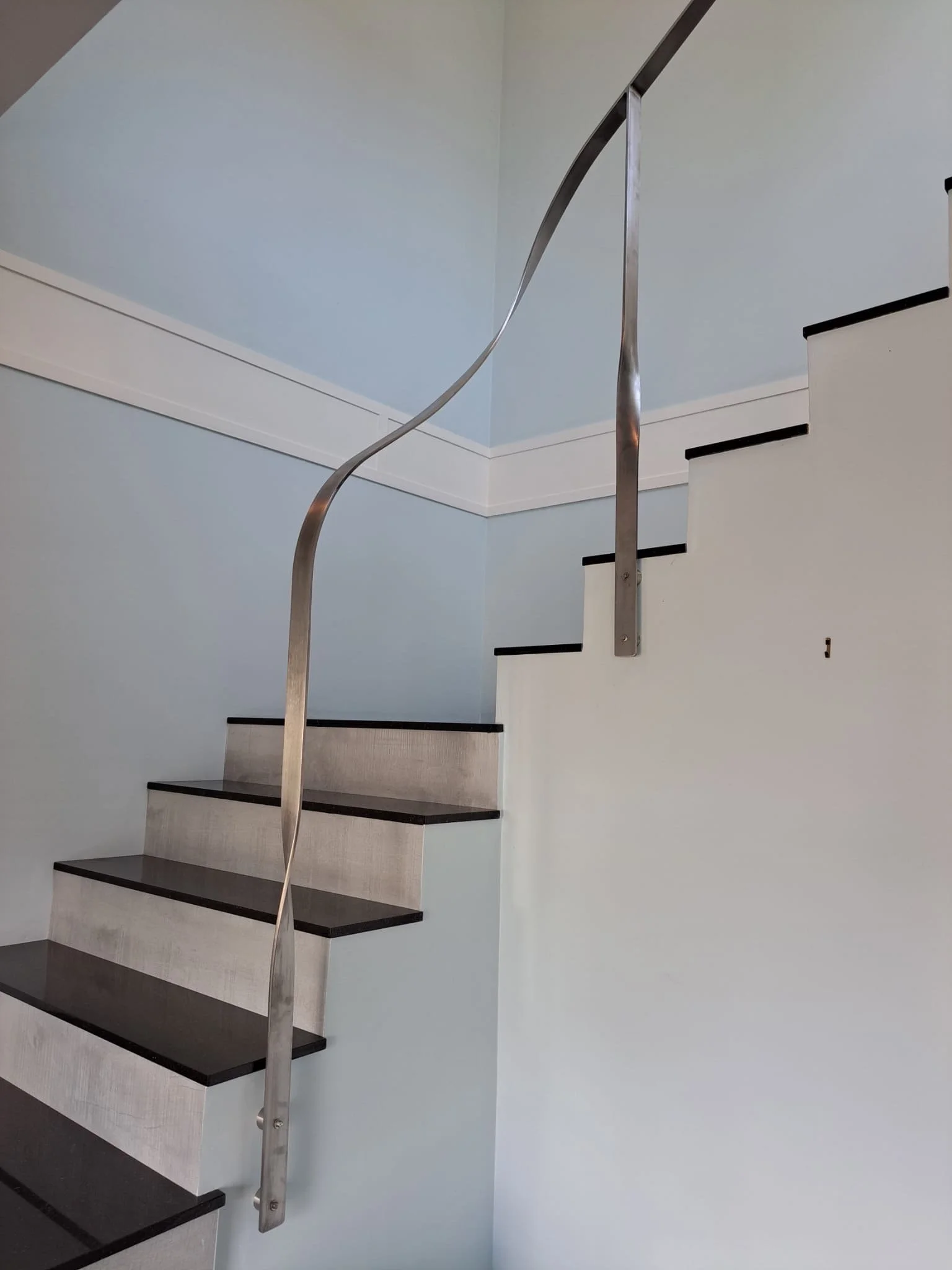 curved custom metal handrail detail Vancouver