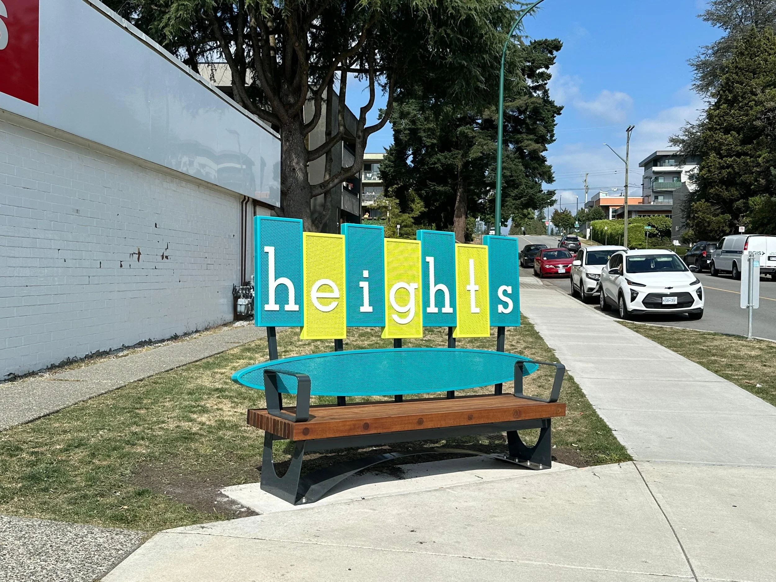 Custom metal bench with signage Vancouver streetscape 1