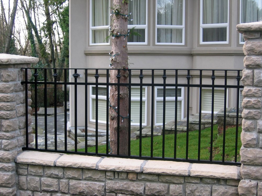 Decorative garden fence with architectural metalwork 55