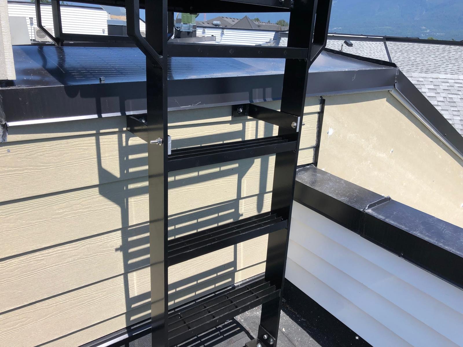 custom metal ladder exterior access Vancouver building 4