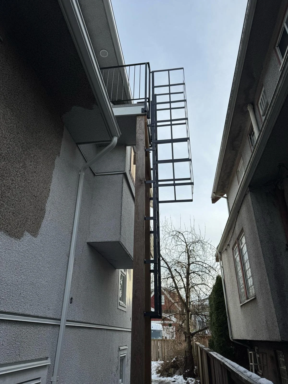 custom metal ladder exterior access Vancouver building 8