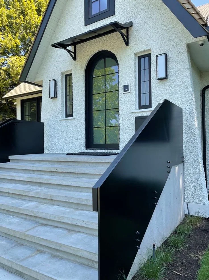 Steel canopy with glass panels Vancouver residential
