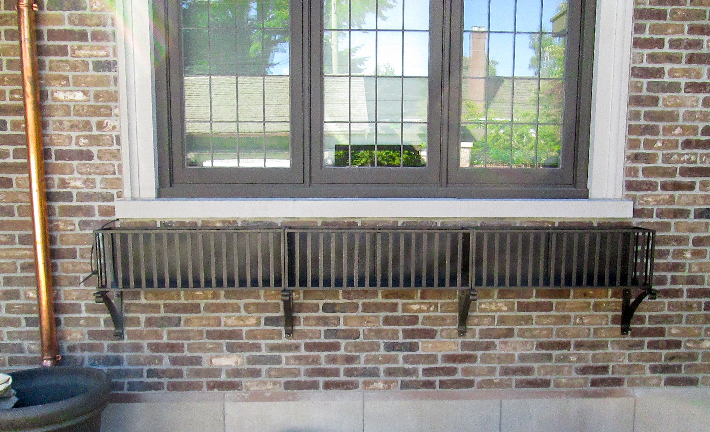 custom metal window guard and planter shelf vancouver