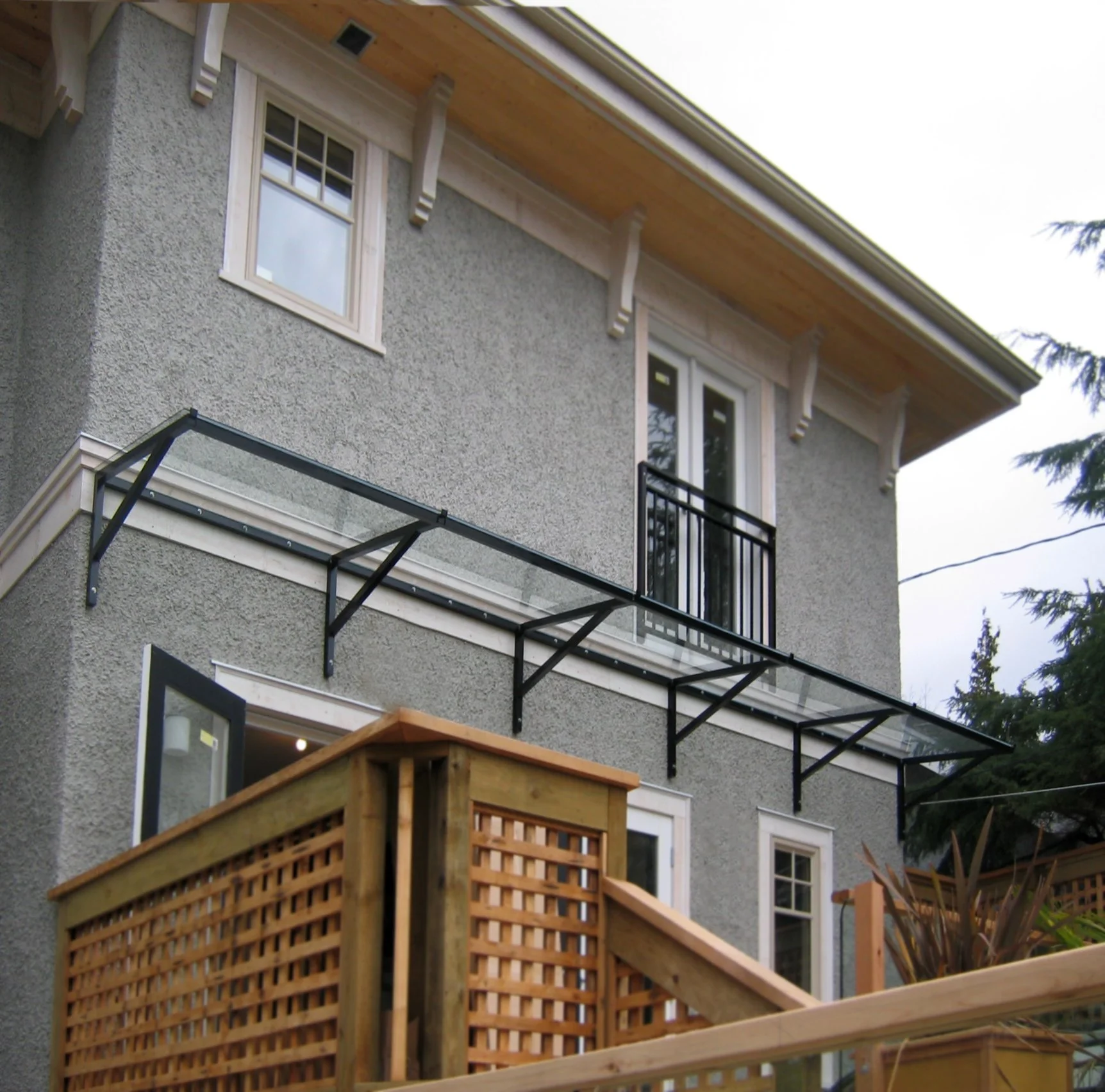 Minimal steel canopy Vancouver exterior walkway