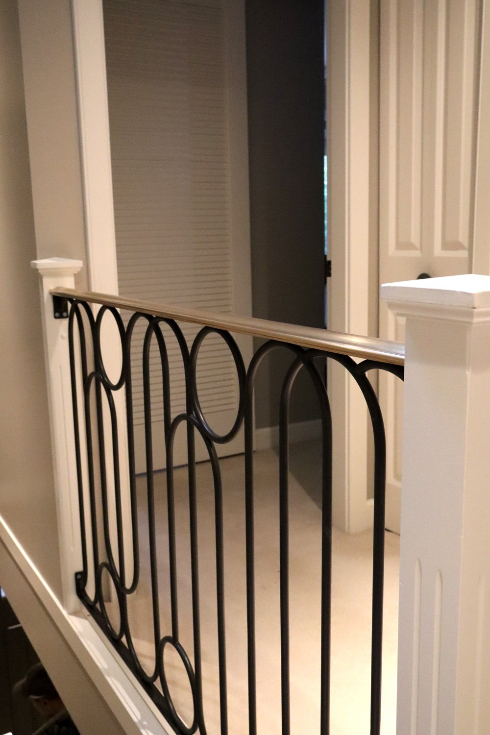 Custom architectural black railing for interior staircase Vancouver