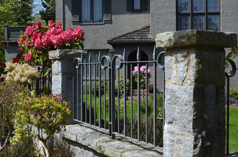 Decorative garden fence with architectural metalwork 200