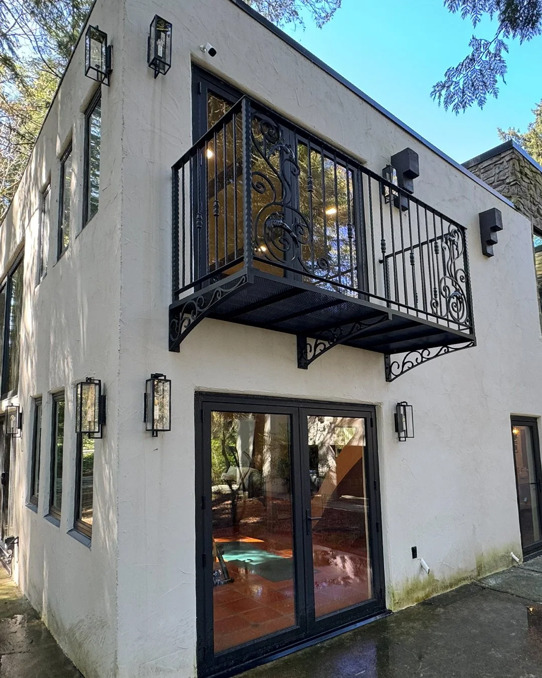 modern black metal stair railing Vancouver exterior
