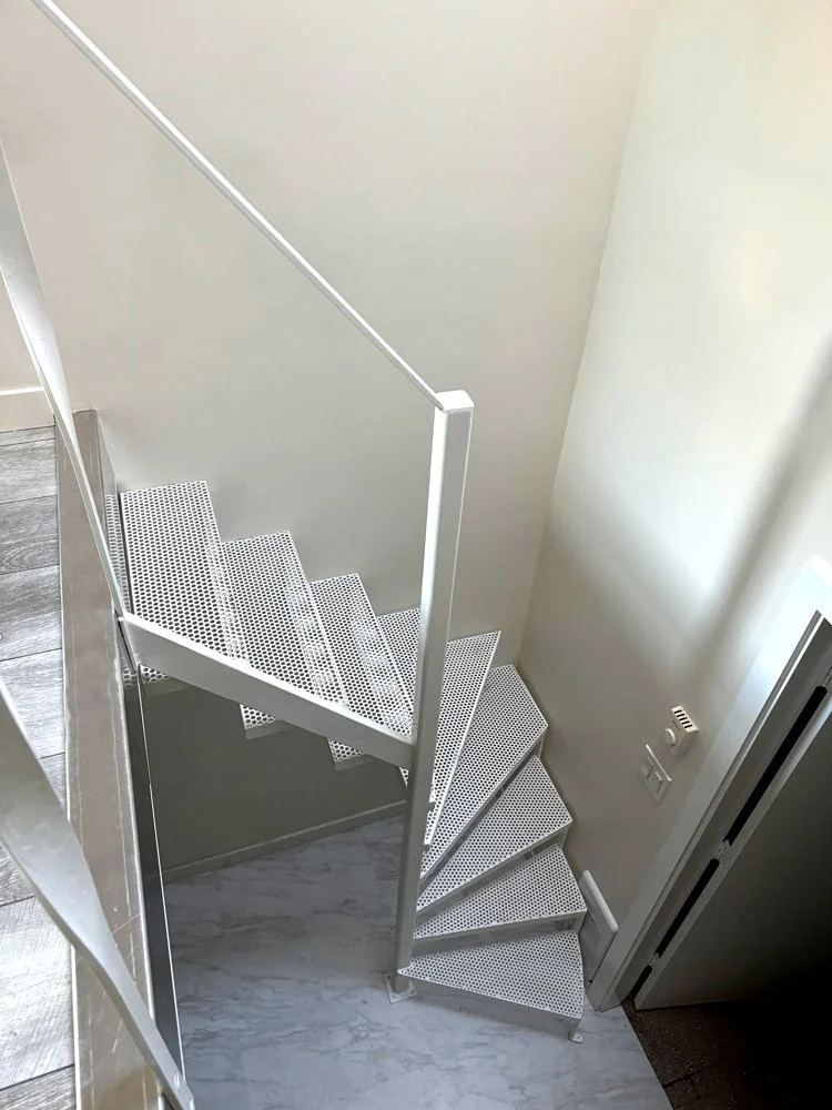 U-shaped metal staircase  bc fabricated by Iron Age Manufacturing