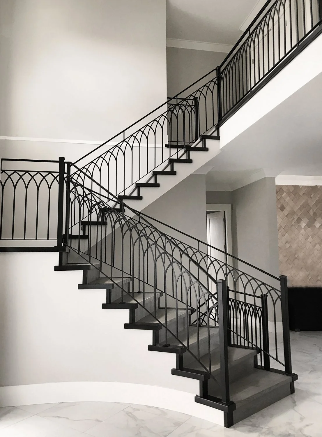 Modern black railing with slim vertical pickets Vancouver
