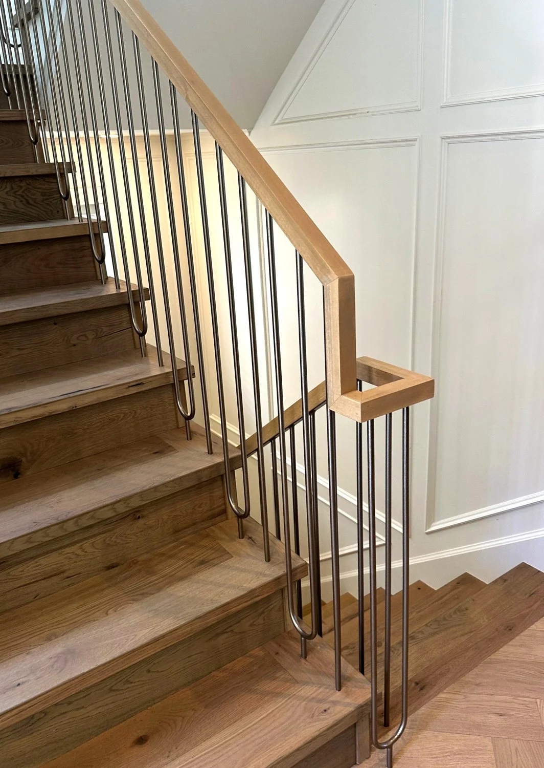 Custom metal guardrail for multi-level residential staircase Vancouver